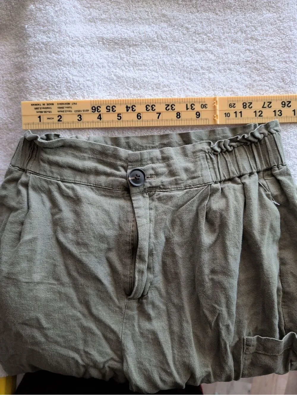 Zara green cargo pants with side pockets.